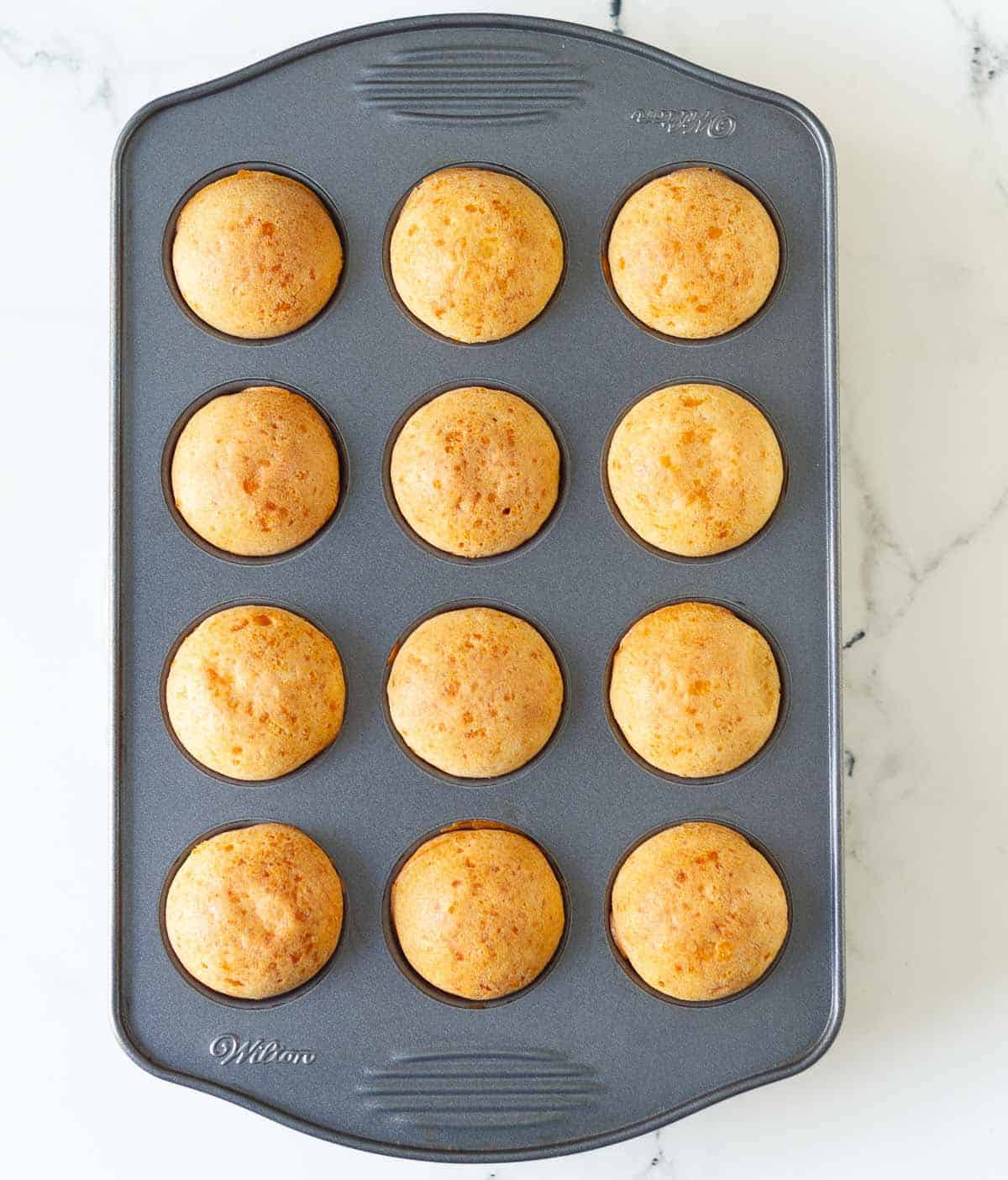 Baked bread in a mini muffin pan.