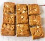 Apple blondies cut into 9 pieces.