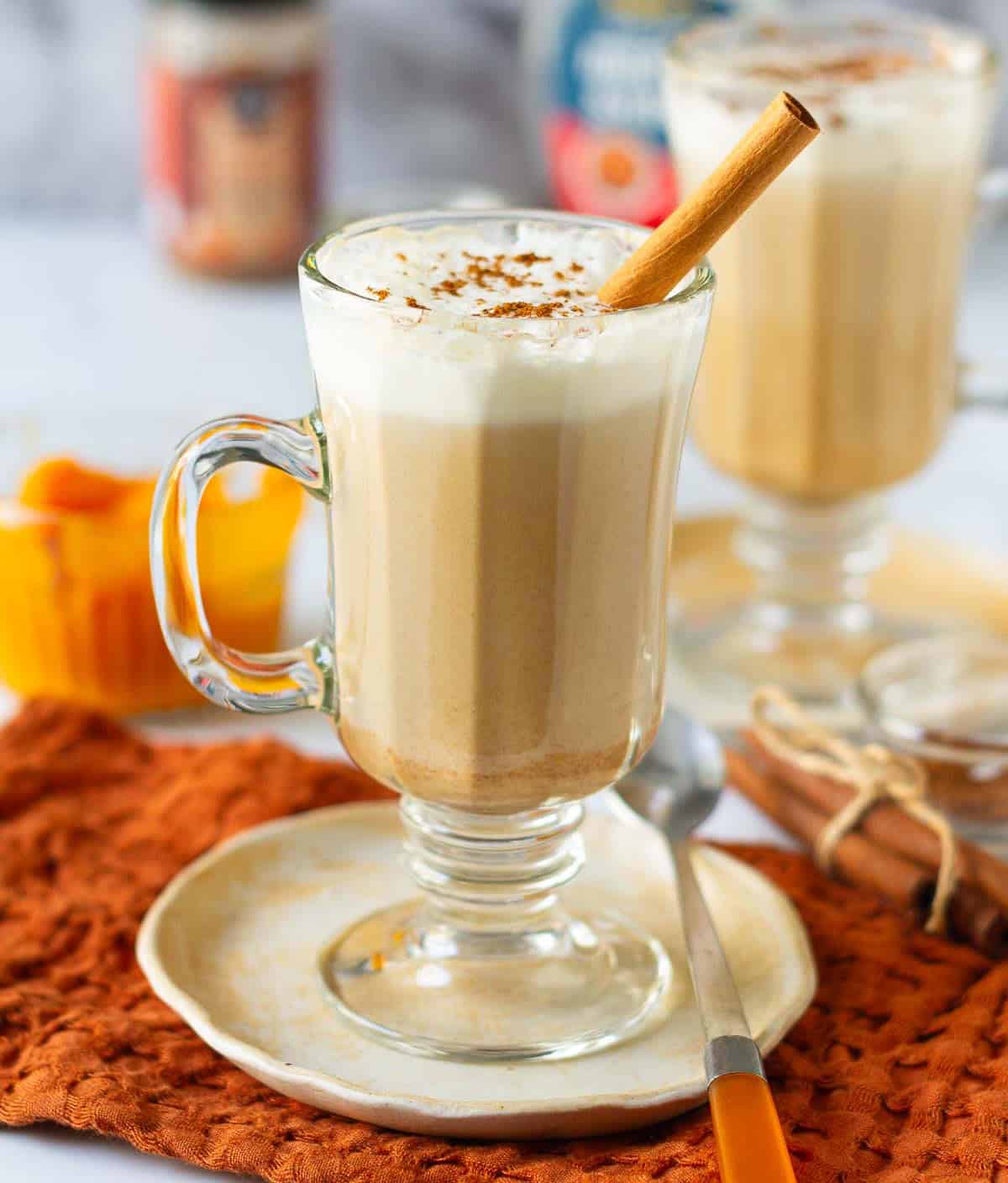 Homemade pumpkin spice latte topped with milk foam, cinnamon, and pumpkin pie spice.