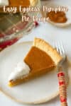 A slice of pumpkin pie with whipped cream on top on a plate with a fork.
