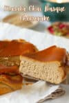 A slice of masala chai Basque cheesecake on a cake server.